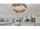 Spacious kitchen featuring stainless steel appliances, center island, and modern lighting at 2501 Rio Grande Dr, Punta Gorda, FL 33950