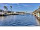 Scenic waterfront view of community, perfect for boating, with homes lining the canals under a clear blue sky at 2501 Rio Grande Dr, Punta Gorda, FL 33950