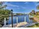 Dock with view of waterfront with private boat access and community waterways on a sunny day at 2501 Rio Grande Dr, Punta Gorda, FL 33950