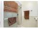 Clean bathroom with glass-enclosed shower, neutral tile, and towel bars, creating a refreshing and functional space at 2550 Ivanhoe St, Port Charlotte, FL 33952
