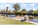 Waterfront property with a private dock for boating and enjoying scenic canal views at 3100 Magnolia Way, Punta Gorda, FL 33950