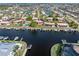 Expansive aerial showcases waterfront homes with personal docks and community waterways in a residential neighborhood at 311 Garvin St # 401C, Punta Gorda, FL 33950