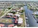 Panoramic aerial view showcasing a residential community with canal access and boat docks for waterfront living at 311 Garvin St # 401C, Punta Gorda, FL 33950