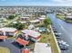 Overhead view of a waterfront neighborhood, complete with private boat docks and a community swimming pool at 311 Garvin St # 401C, Punta Gorda, FL 33950