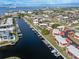Stunning aerial view of waterfront community with private boat docks and easy access to the open bay at 311 Garvin St # 401C, Punta Gorda, FL 33950
