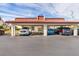 Assigned carport parking spot #401 in a community with a red tile roof, providing shade for vehicles at 311 Garvin St # 401C, Punta Gorda, FL 33950