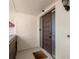 Condo entrance with dark brown door at 311 Garvin St # 401C, Punta Gorda, FL 33950