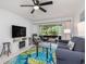 Comfortable living room with view to the screened in porch at 311 Garvin St # 401C, Punta Gorda, FL 33950