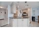 Well-lit kitchen with stainless steel appliances and granite countertops, offering a modern and functional cooking space at 3256 White Ibis Ct # 13B, Punta Gorda, FL 33950