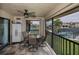Lanai with a pool and tennis court view at 3256 White Ibis Ct # 13B, Punta Gorda, FL 33950