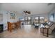 Open-concept living space with water views includes a dining table and a comfortable seating area at 3256 White Ibis Ct # 13B, Punta Gorda, FL 33950