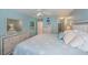 Spacious bedroom with sliders to the screened-in patio and ample natural light at 3256 White Ibis Ct # 13B, Punta Gorda, FL 33950