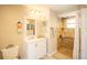 Bathroom with vanity, toilet, and stand-up shower at 4381 Northshore Dr, Punta Gorda, FL 33980