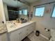 Bathroom featuring dual sinks and enclosed shower at 4381 Northshore Dr, Punta Gorda, FL 33980