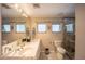 Bathroom featuring dual sinks and enclosed shower at 4381 Northshore Dr, Punta Gorda, FL 33980