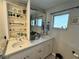 Bathroom vanity with dual sinks and storage at 4381 Northshore Dr, Punta Gorda, FL 33980