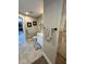 This is a bright bathroom with a grab bar installed and tiled floors at 4381 Northshore Dr, Punta Gorda, FL 33980