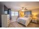 Bedroom with a fan and a large window at 4381 Northshore Dr, Punta Gorda, FL 33980