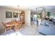 Cozy dining room adjacent to the living room, perfect for Gathering meals and entertaining at 4381 Northshore Dr, Punta Gorda, FL 33980