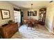 Well-lit dining room features wood table, chairs, and floors at 4381 Northshore Dr, Punta Gorda, FL 33980