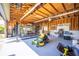 This expansive garage includes car lift, ceiling fan, and shelving with tools for any and all projects at 4381 Northshore Dr, Punta Gorda, FL 33980