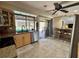 Well-appointed kitchen with a breakfast bar and view of the pool through the window at 4381 Northshore Dr, Punta Gorda, FL 33980
