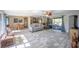 Open-concept living room and dining area with sliding glass doors to the outdoor patio at 4381 Northshore Dr, Punta Gorda, FL 33980