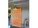 Modern outdoor shower with wood paneling, providing a refreshing and private space for rinsing off after a swim at 4381 Northshore Dr, Punta Gorda, FL 33980