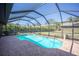 Beautiful screened-in pool with lush surroundings offering a private and relaxing retreat at 4381 Northshore Dr, Punta Gorda, FL 33980