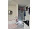 Modern bathroom featuring a tub and glass shower at 501 San Cristobal Ave, Punta Gorda, FL 33983