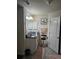Bright bathroom with vanity, framed mirror and stool at 501 San Cristobal Ave, Punta Gorda, FL 33983