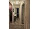 Hallway with tiled floor leading to other rooms of the house at 501 San Cristobal Ave, Punta Gorda, FL 33983