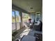 Relaxing screened patio with comfortable seating, perfect for enjoying the outdoor view at 501 San Cristobal Ave, Punta Gorda, FL 33983