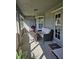 Enclosed patio featuring a sofa, table and chairs, perfect for enjoying the outdoors at 501 San Cristobal Ave, Punta Gorda, FL 33983