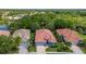 Beautiful aerial view of a single Gathering home with well manicured lawns and mature landscaping at 5017 Hanging Moss Ln, Sarasota, FL 34238