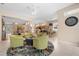 Expansive open-concept living area showcasing dining, kitchen, and sitting area at 5017 Hanging Moss Ln, Sarasota, FL 34238