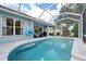Enjoy the outdoors with a pristine pool, and spacious lanai in this lovely outdoor space at 5017 Hanging Moss Ln, Sarasota, FL 34238