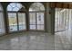 Bright dining area with large windows offering view of the pool at 507 Monaco Dr, Punta Gorda, FL 33950