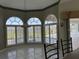 Bright dining area with large windows offering view of the pool at 507 Monaco Dr, Punta Gorda, FL 33950