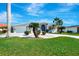 Charming home with a well-manicured lawn and decorative driveway at 507 Monaco Dr, Punta Gorda, FL 33950