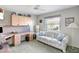 Office space with a built-in desk, sofa, and overhead storage at 507 Monaco Dr, Punta Gorda, FL 33950