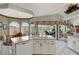 Bright kitchen with island looking onto the breakfast nook, perfect for meals and entertaining at 507 Monaco Dr, Punta Gorda, FL 33950