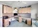 Bright home office features built-in desk, cabinets, and plenty of storage space, perfect for remote work at 507 Monaco Dr, Punta Gorda, FL 33950