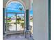 Covered porch and chair with view of street at 507 Monaco Dr, Punta Gorda, FL 33950