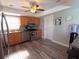 Well-lit kitchen featuring stainless steel appliances, wood cabinets, and tile backsplash at 61 Caddy Rd, Rotonda West, FL 33947