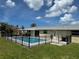 Fenced pool area with patio offers a secure and inviting outdoor living space at 61 Caddy Rd, Rotonda West, FL 33947