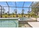 Inviting hot tub and pool with clear blue water, perfect for relaxation and enjoyment at 664 Rotonda Cir, Rotonda West, FL 33947