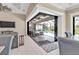 Open floorplan with clear view to the screened pool and patio, with a seating area at 664 Rotonda Cir, Rotonda West, FL 33947