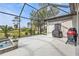 Expansive pool area featuring a spa, summer kitchen, grill and plenty of space at 664 Rotonda Cir, Rotonda West, FL 33947