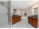 Bathroom with tiled shower, soaking tub, double vanities, and arched mirrors at 87 Vivante Blvd # 8732, Punta Gorda, FL 33950